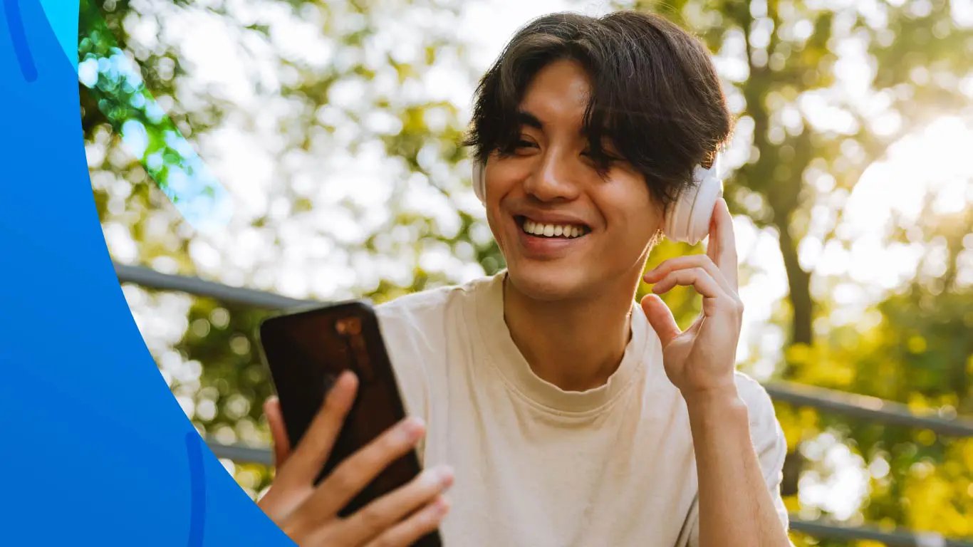 11. man with headphones on phone