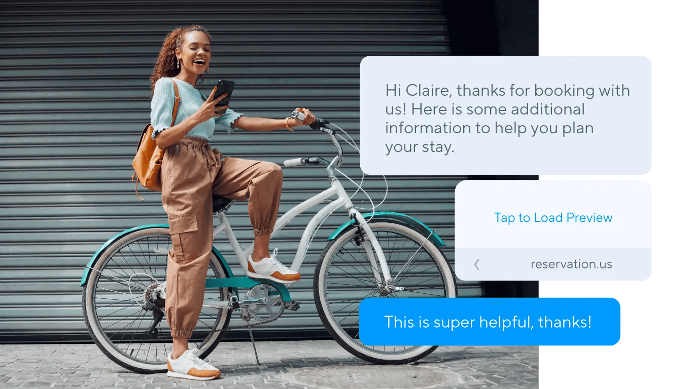 woman on bike receiving business SMS with attachment 