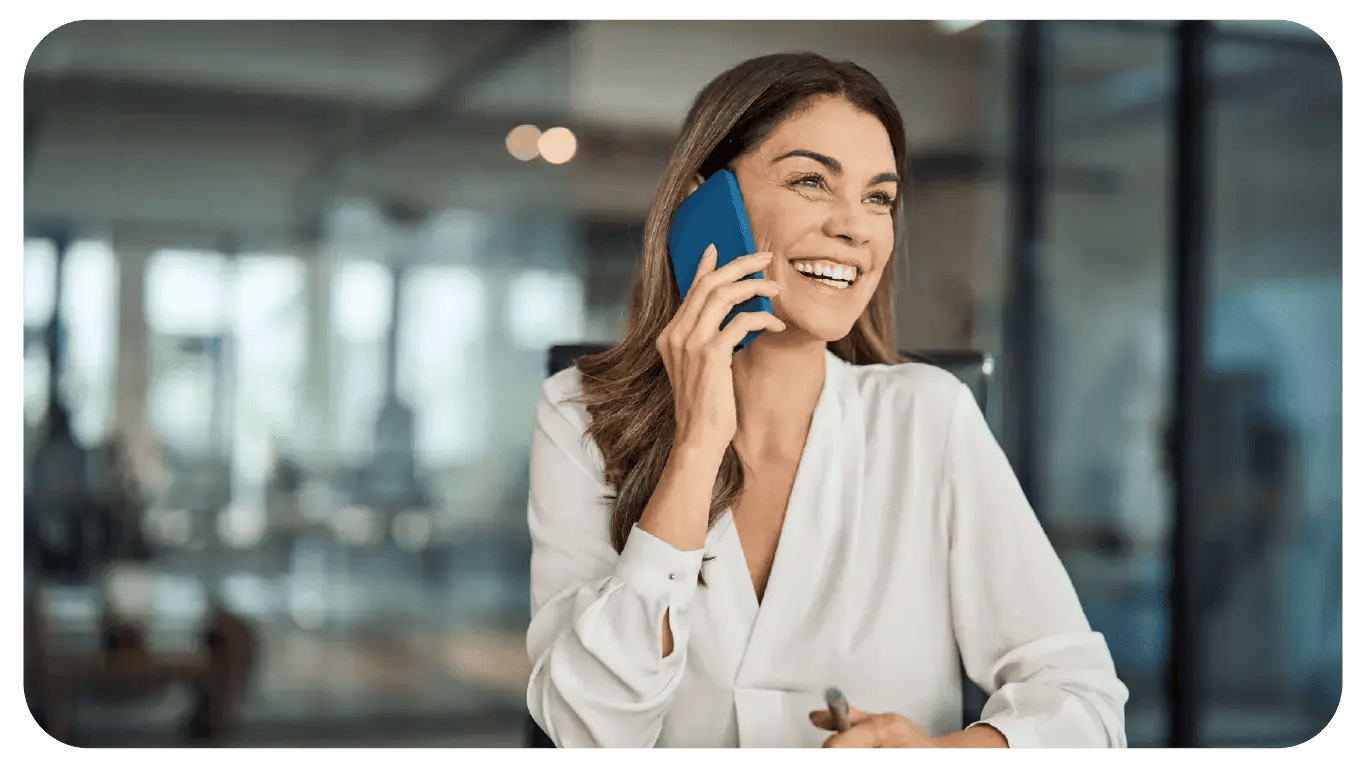 A woman uses the Direct Inward Dialing option on her smartphone