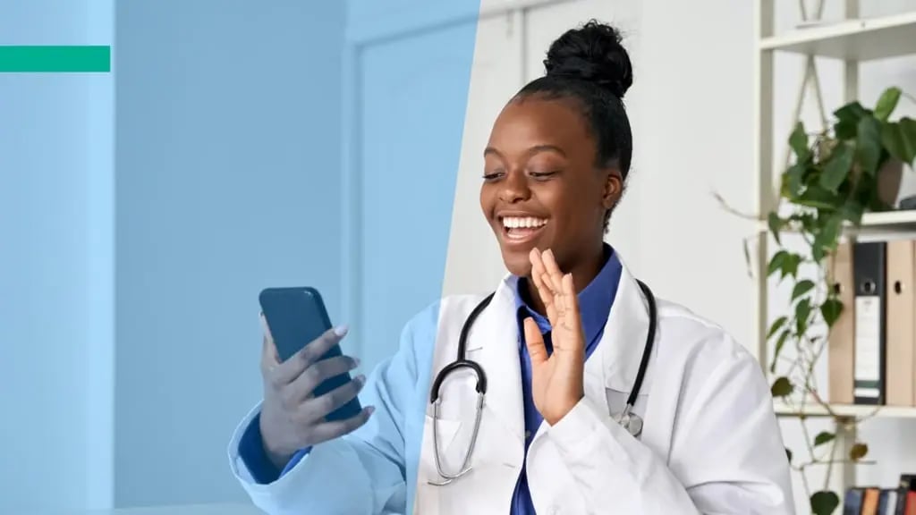 A smiling doctor speaking by mobile