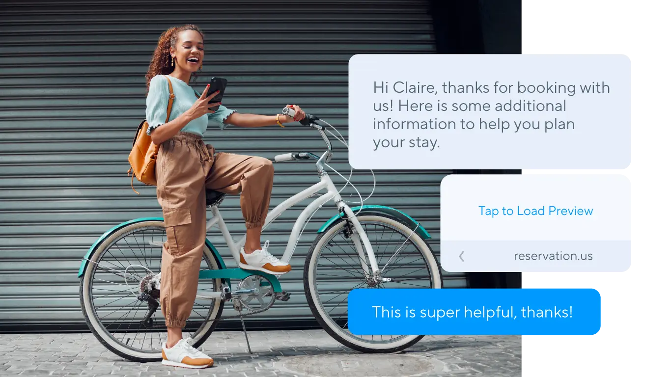 woman on bike receiving business SMS with attachment 